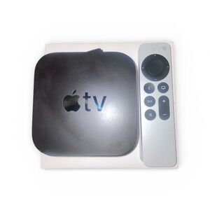 Apple TV Box and Remote in Black and White